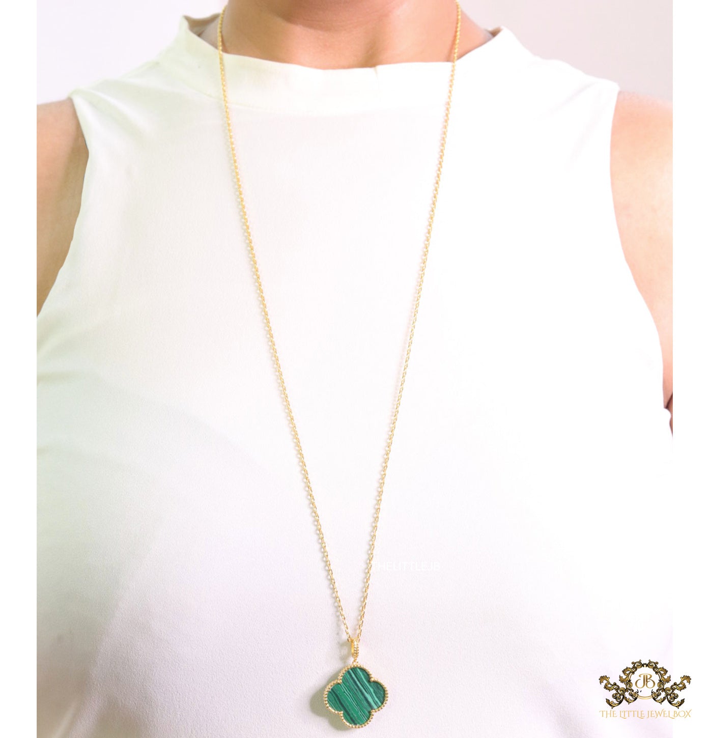 Malachite green clover pendant in gold plated chain