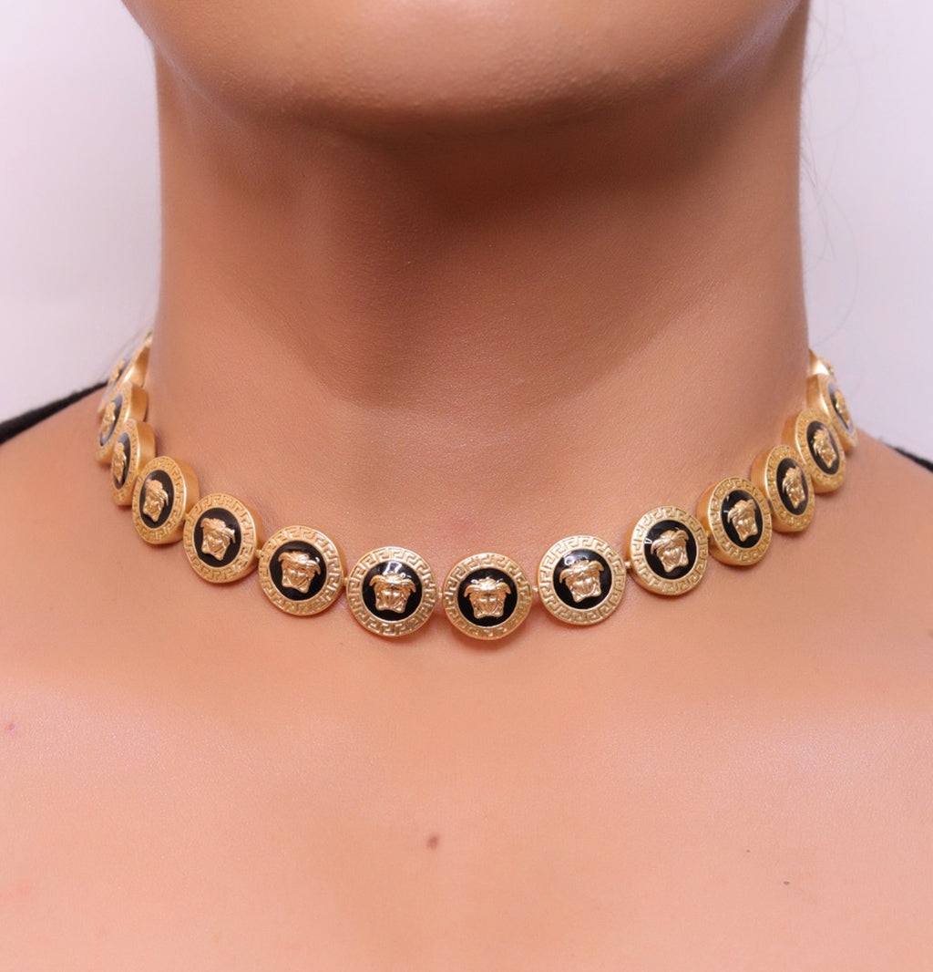 Gold plated Medusa motif on black circles necklace