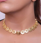 Gold plated embossed Medusa motif on gold circle base necklace