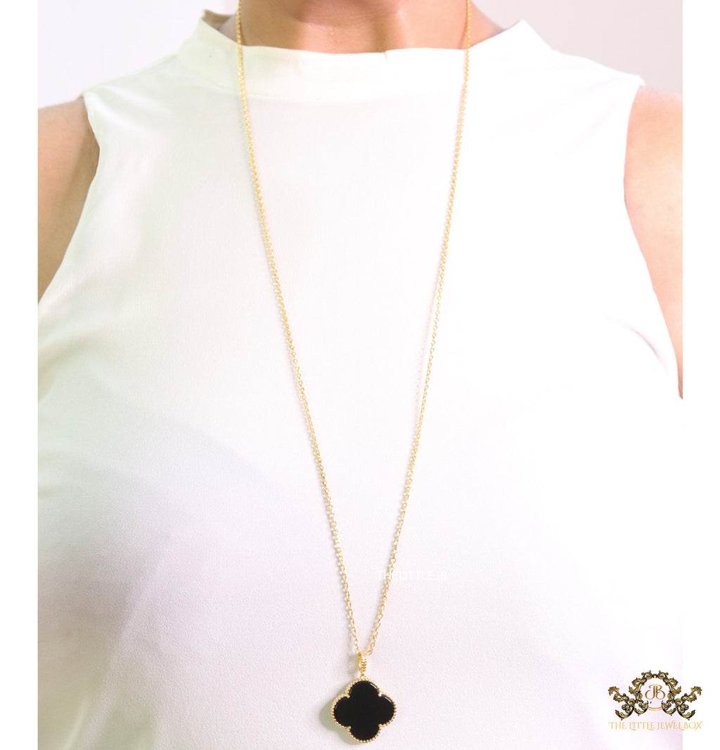 Black enamel clover pendant in gold plated chain