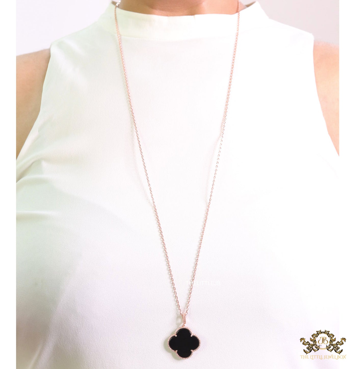 Black enamel clover pendant in rose gold plated chain