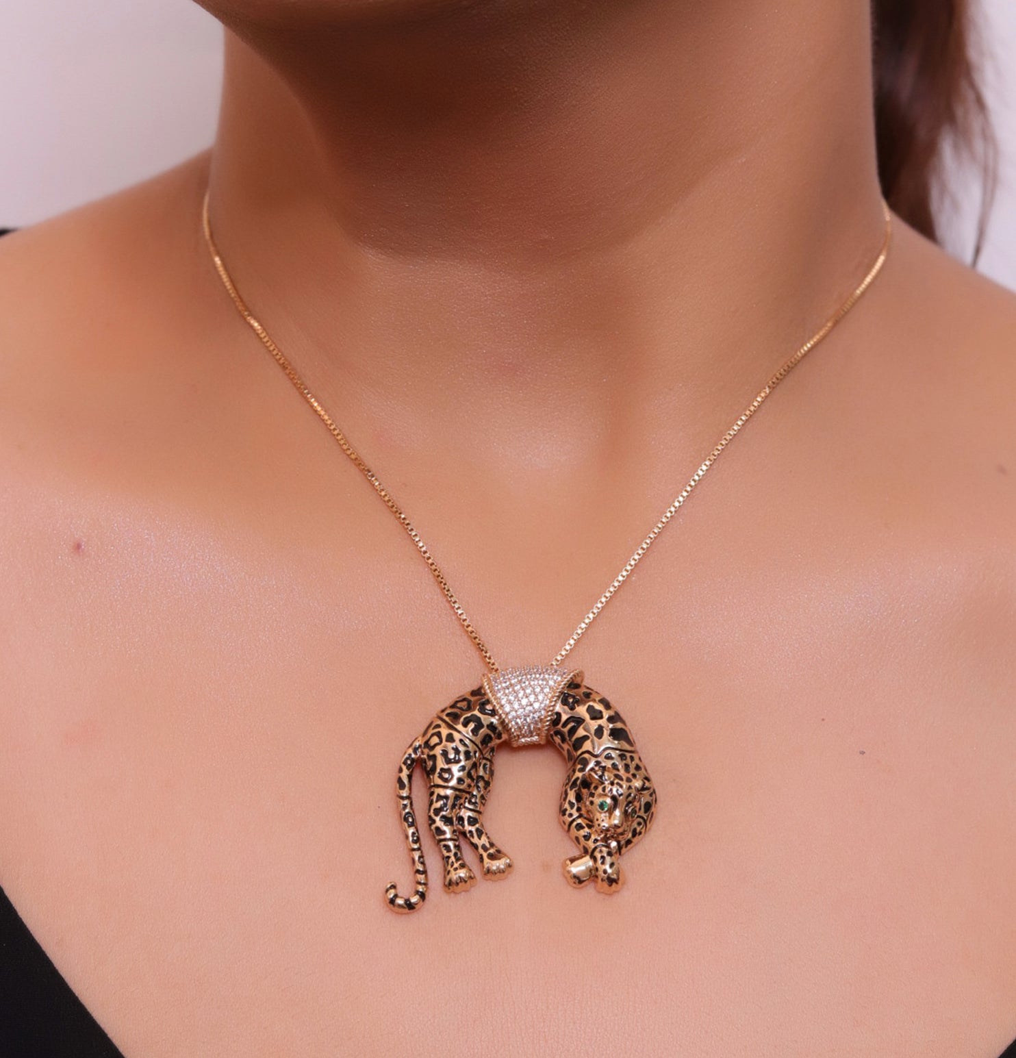 Antique rose  gold resting plated leopard pendant with cubic zirconia and rose golden chain
