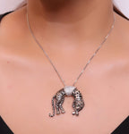 Platinum plated resting leopard pendant with cubic zirconia and Platinum chain