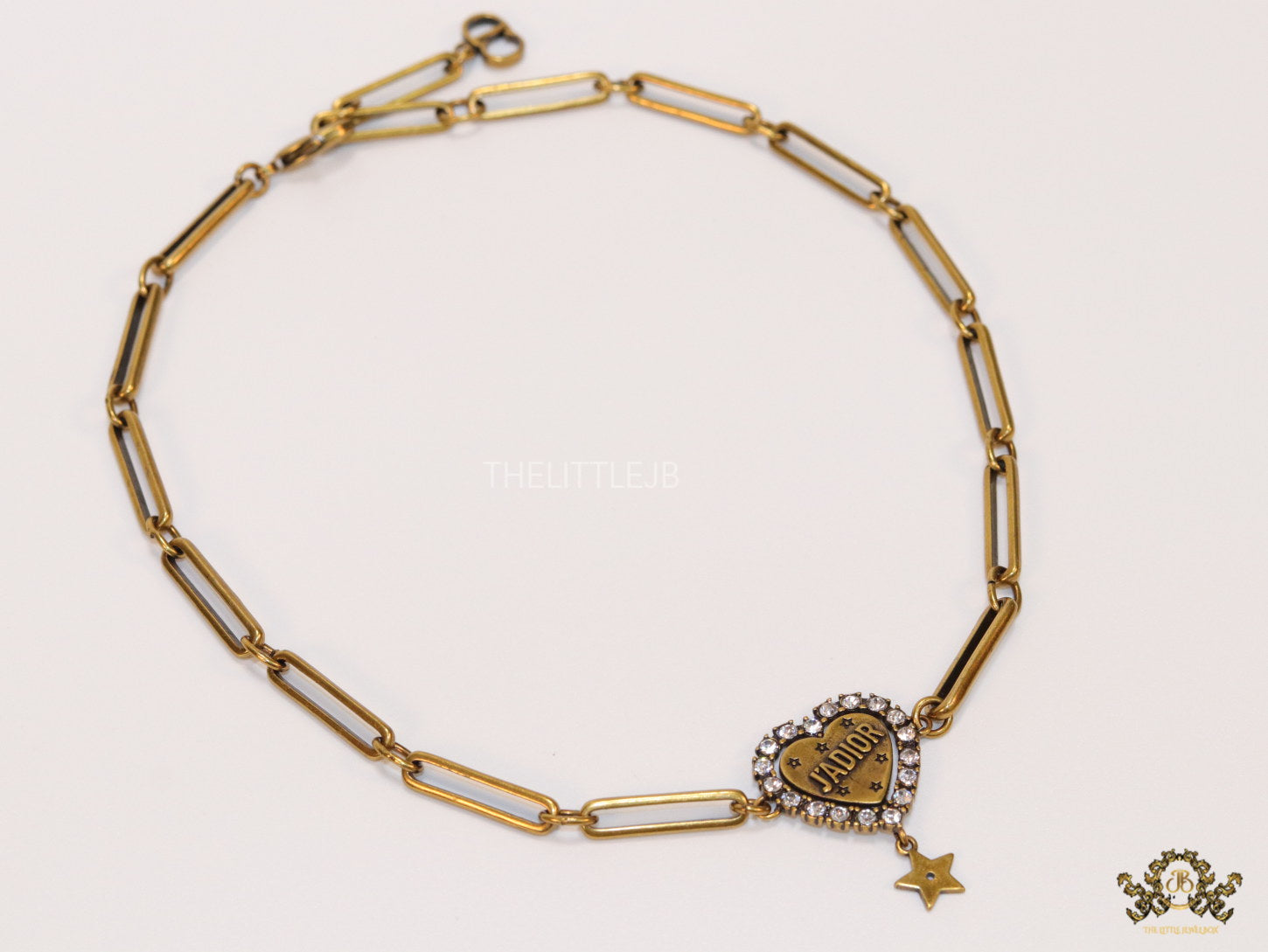 Gold plated link chain necklace with heart shaped alphabet pendant