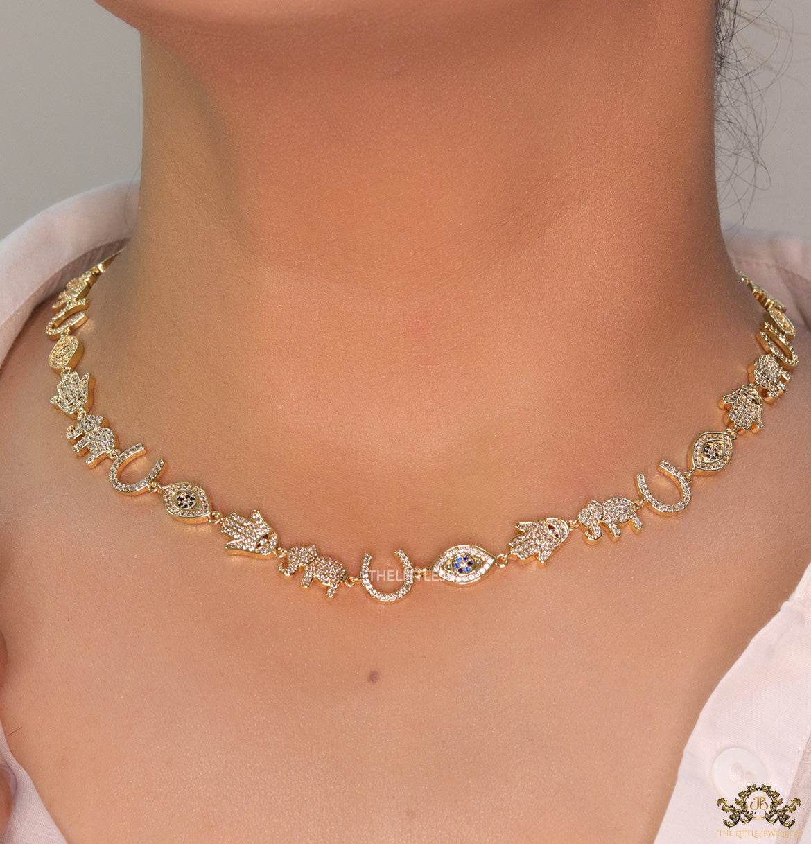 Choker style necklace with charms in gold finish