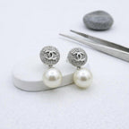 Double C Platinum Stud with CZ and Pearl Drop