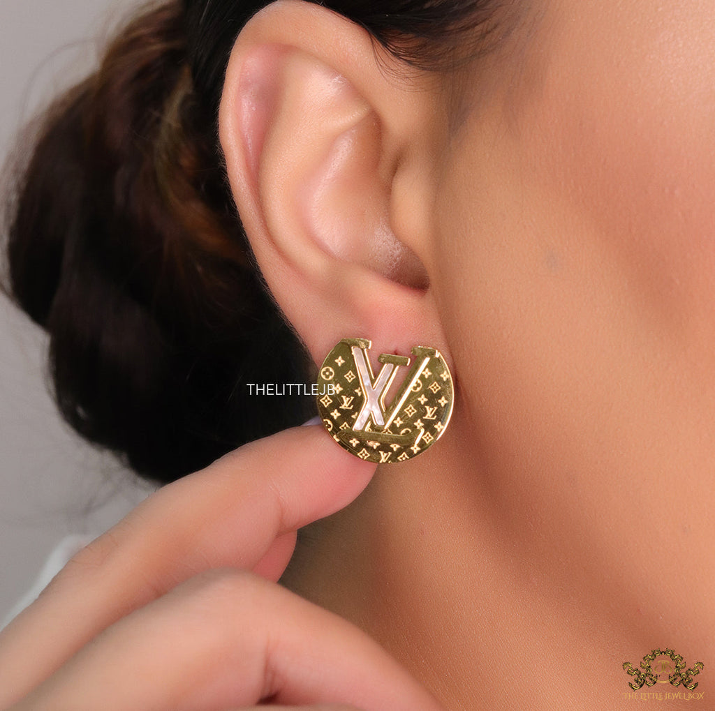 Gold plated stud earrings with alphabet motifs