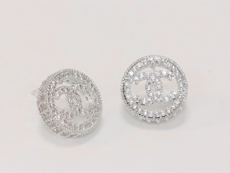 Round double C studs with CZ in platinum