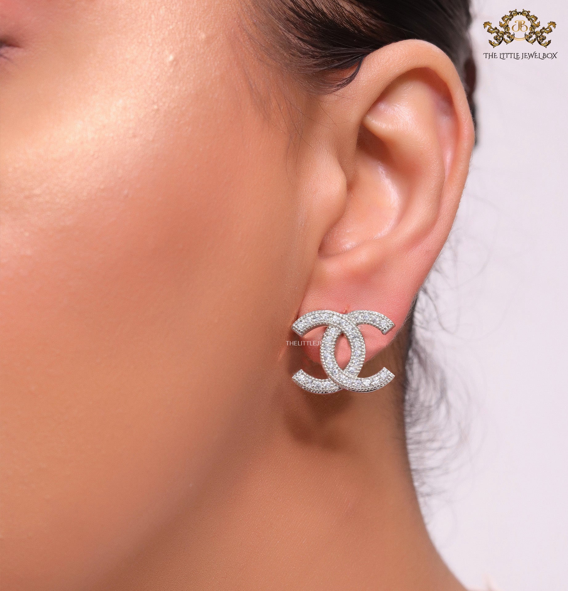 Platinum plated twin C motif cz studs