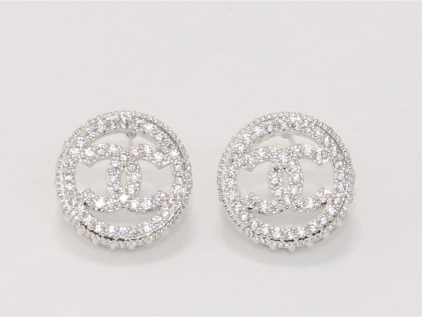 Round double C studs with CZ in platinum