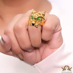 Gold plated 3D panther head ring with cz and emerald green eyes