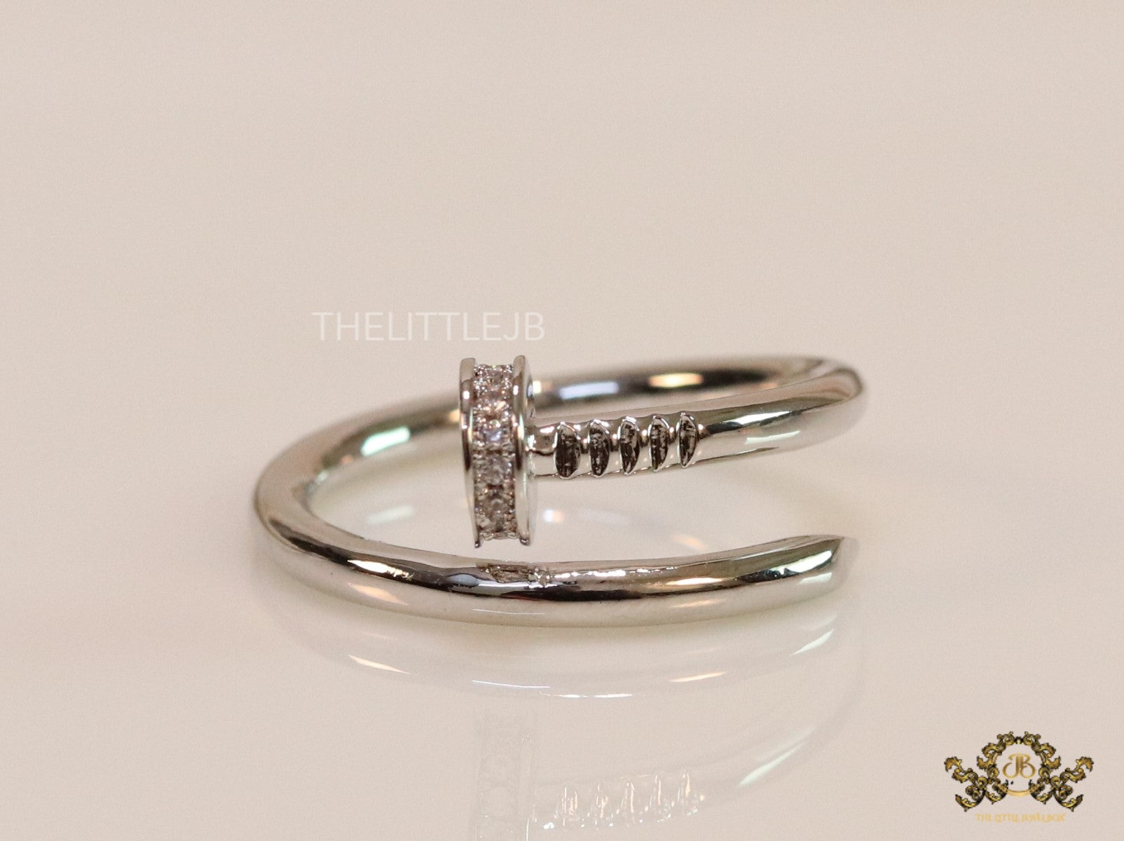 Platinum plated cz nail ring