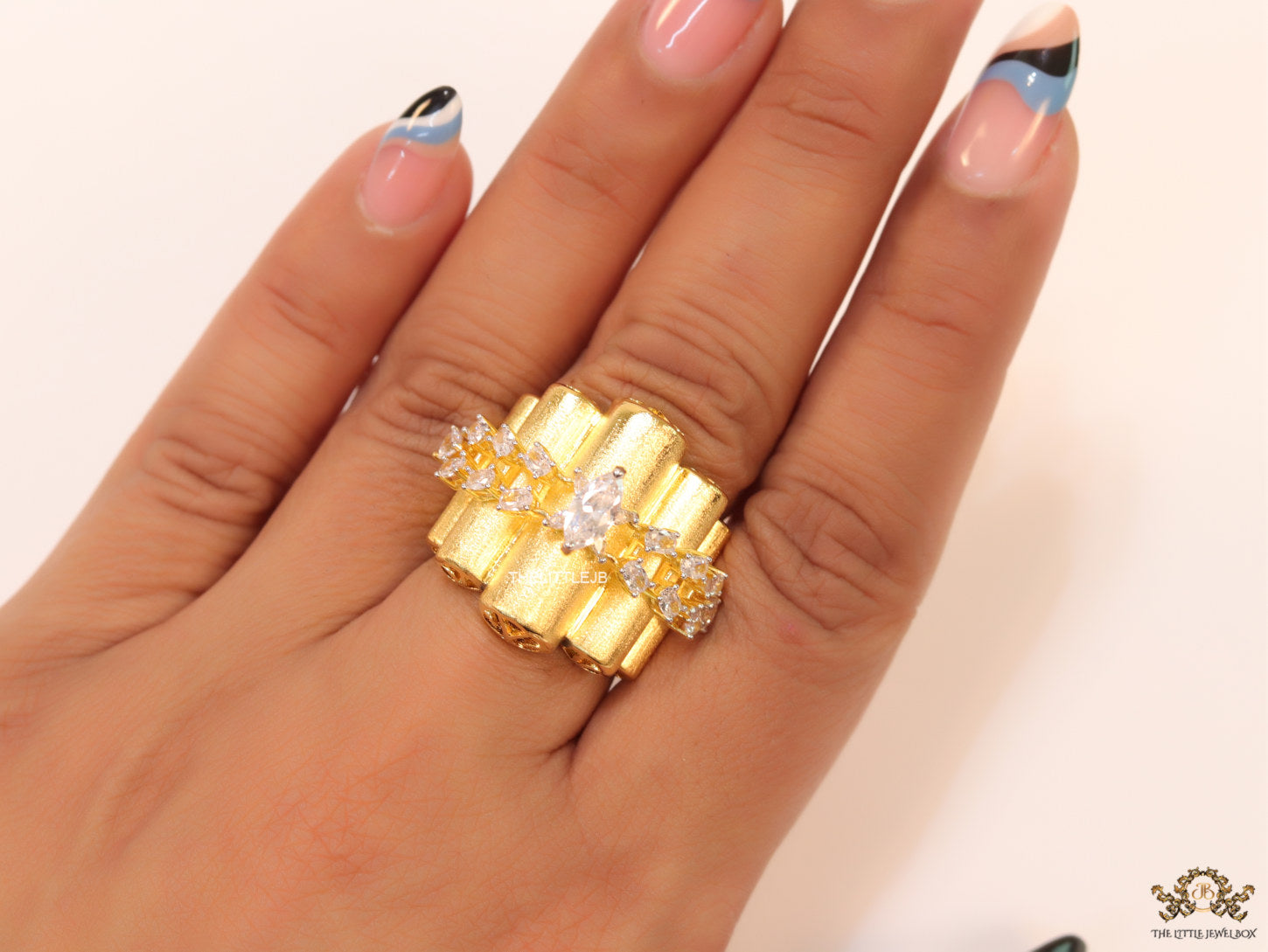 Fancy gold plated adjustable ring with marquise pointers