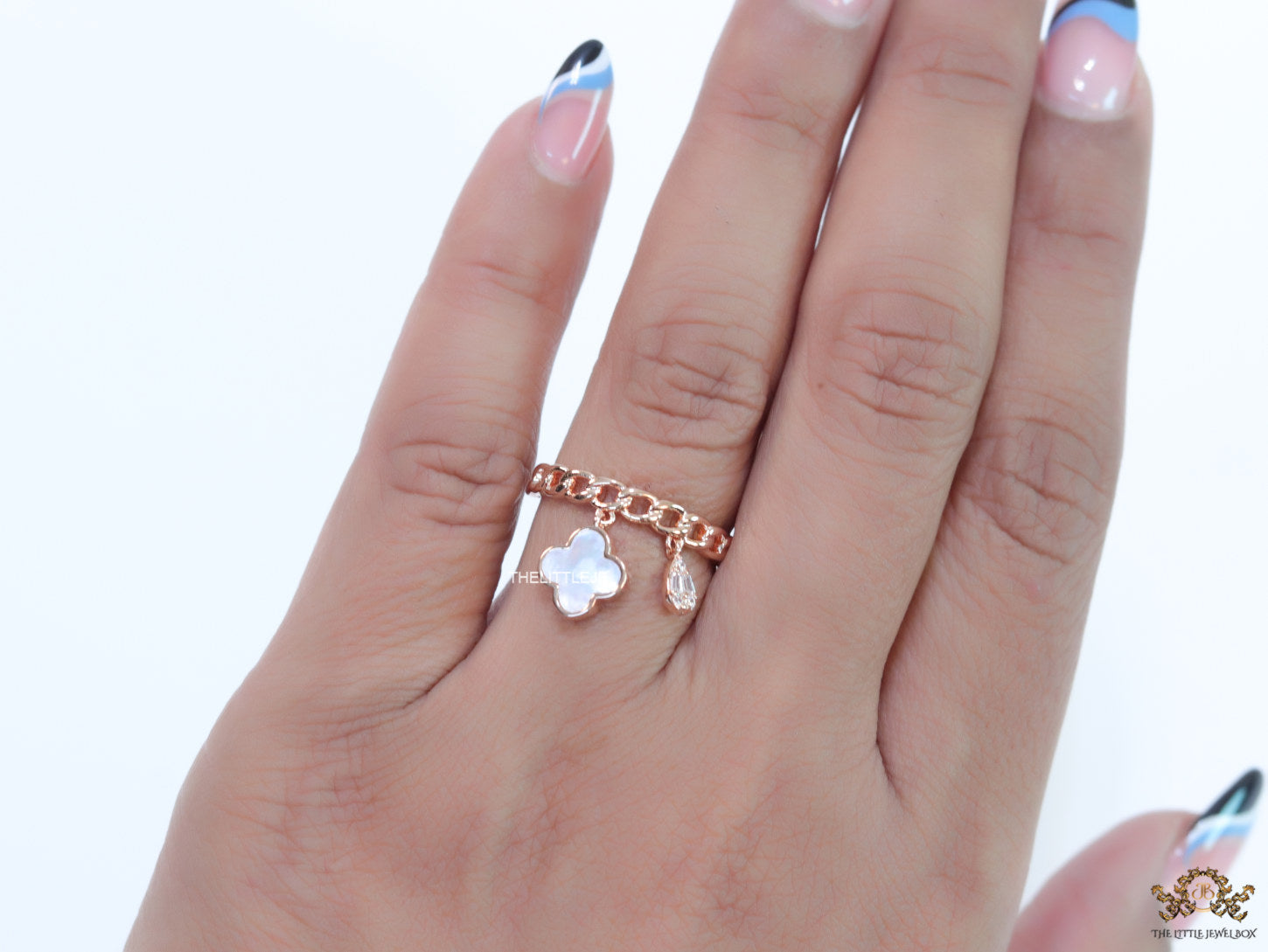 Rose gold plated link chain ring with MOP clover and cz drop