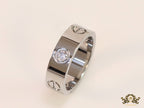 Broad 6mm platinum plated band with screws and stones