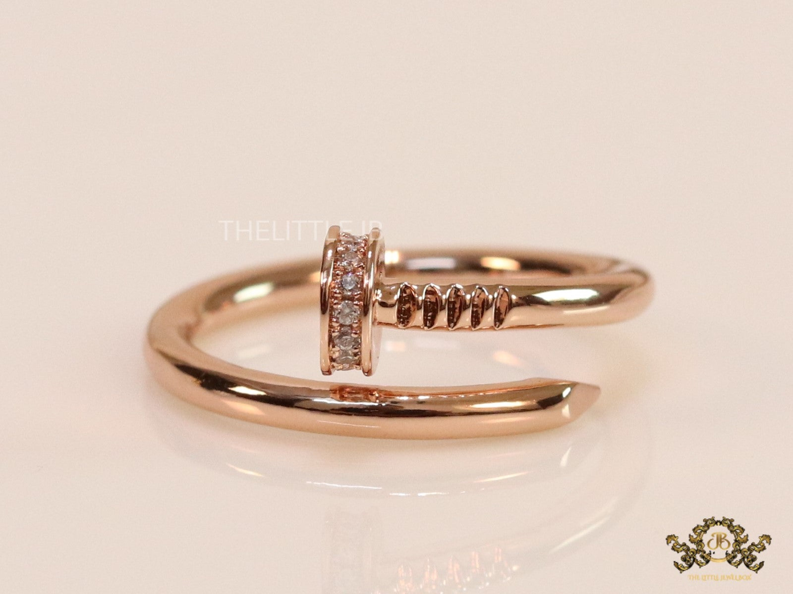 Rose gold plated cz nail ring