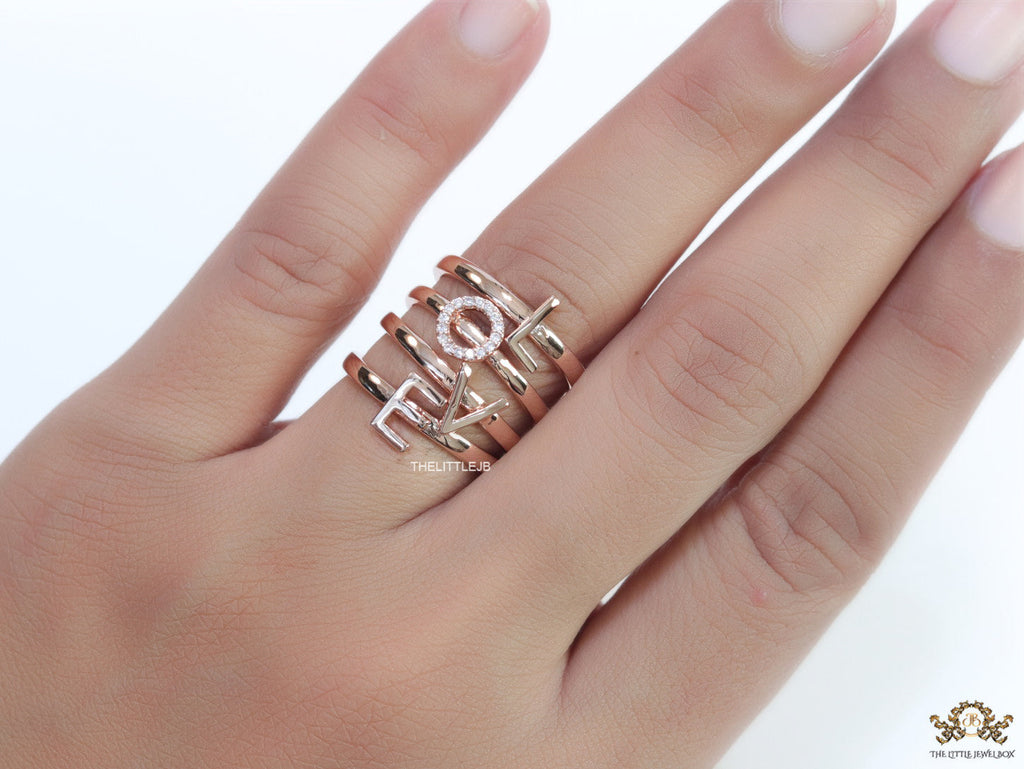 Gold plated layered alphabet ring with tiny embedded cz stones