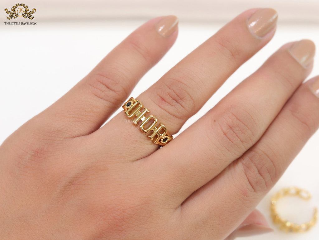 Gold plated alphabet open ring with black cz