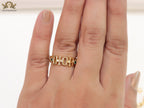 Gold plated alphabet open ring with green cz
