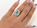 Adjustable drop shape fancy cz ring with green centre and platinum finish