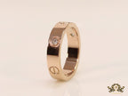 Narrow 4.5mm rose gold band with screws and stones