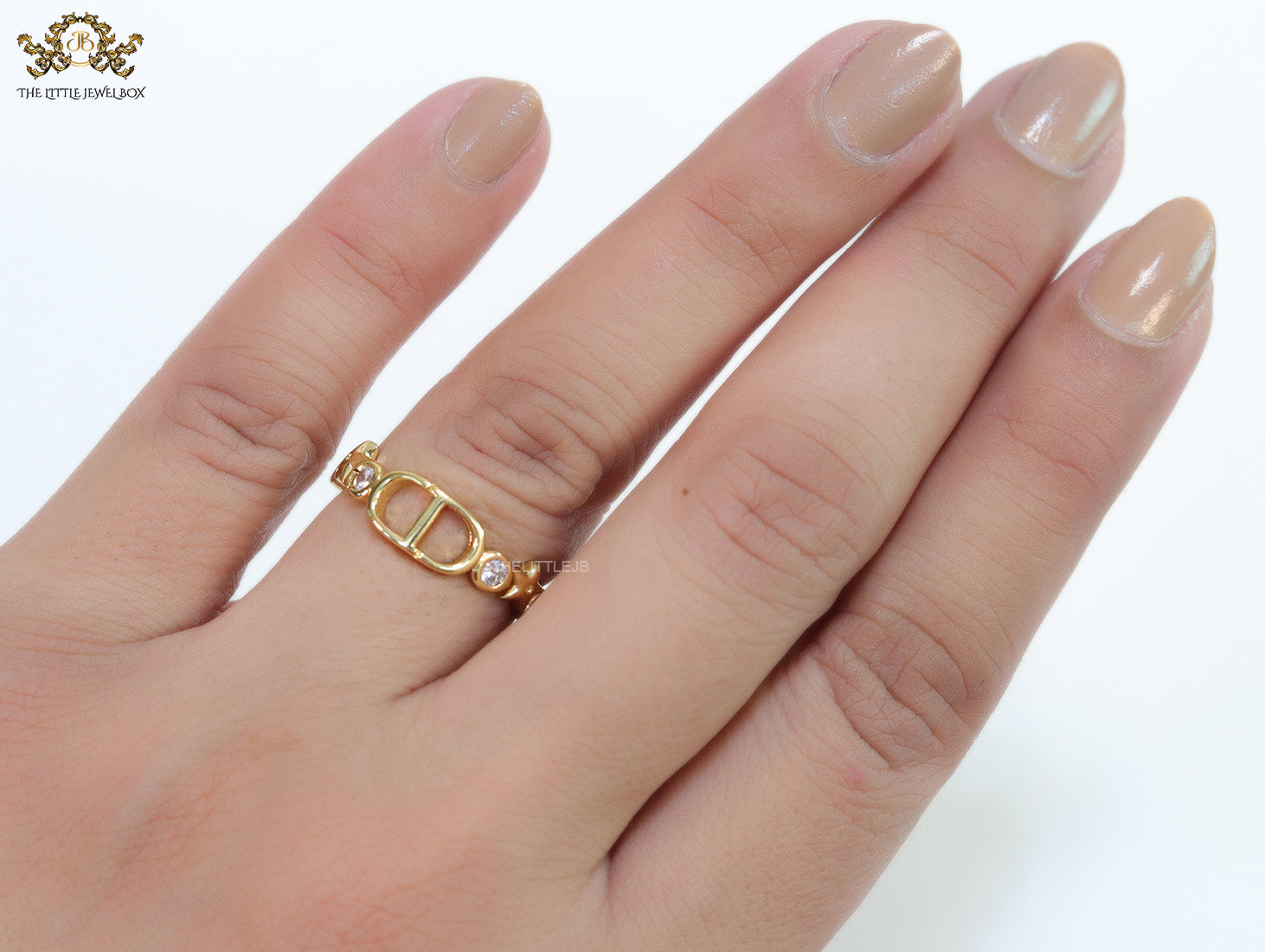 Gold finish alphabet open ring with white cz