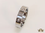 Narrow 4.5mm platinum plated band with screws and stones