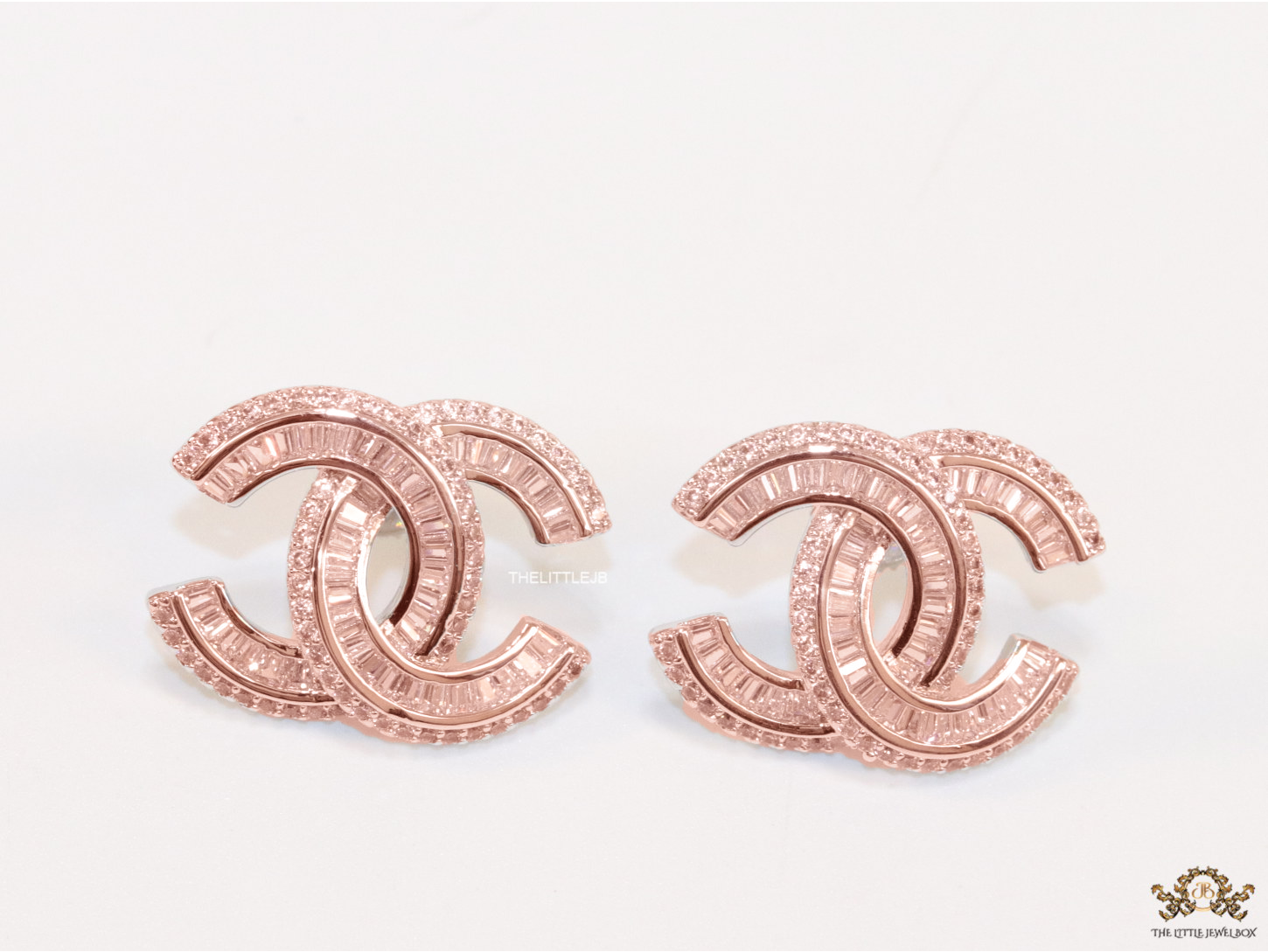 Rose Gold plated cz studs in twin C motif