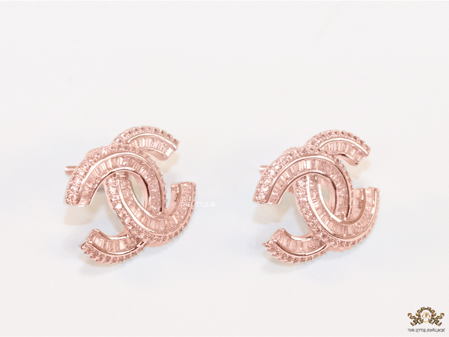 Rose Gold plated cz studs in twin C motif