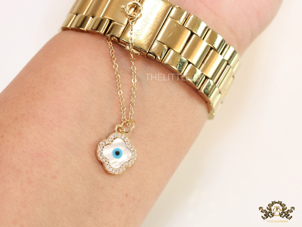 Gold plated cz evil eye clover watch charm with mother of pearl element